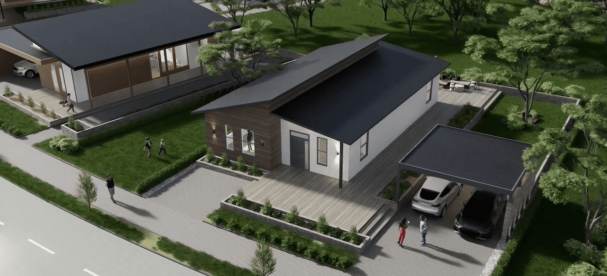 Modern home with a black roof, wood siding, carport, and green lawn in aerial view.