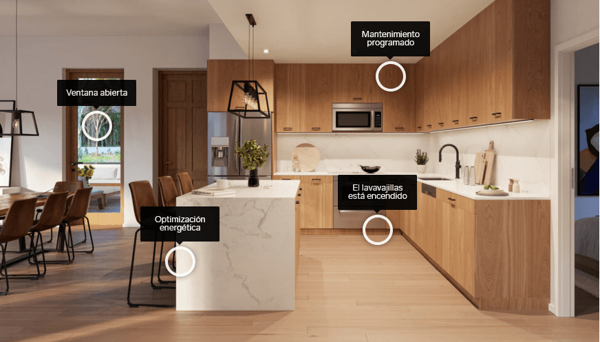 Modern kitchen with wood cabinets and marble island, featuring smart home status labels in Spanish.